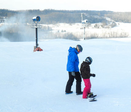 Snowboard Instructor Gives Private Lesson at Paoli Peaks