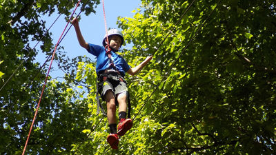 Kids Participate in Ropes Course at Roundtop