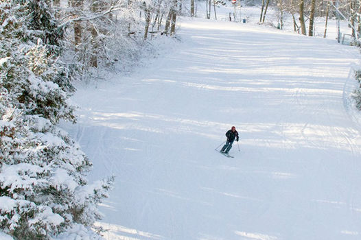 Skier Makes Downhill Turns at Roundtop