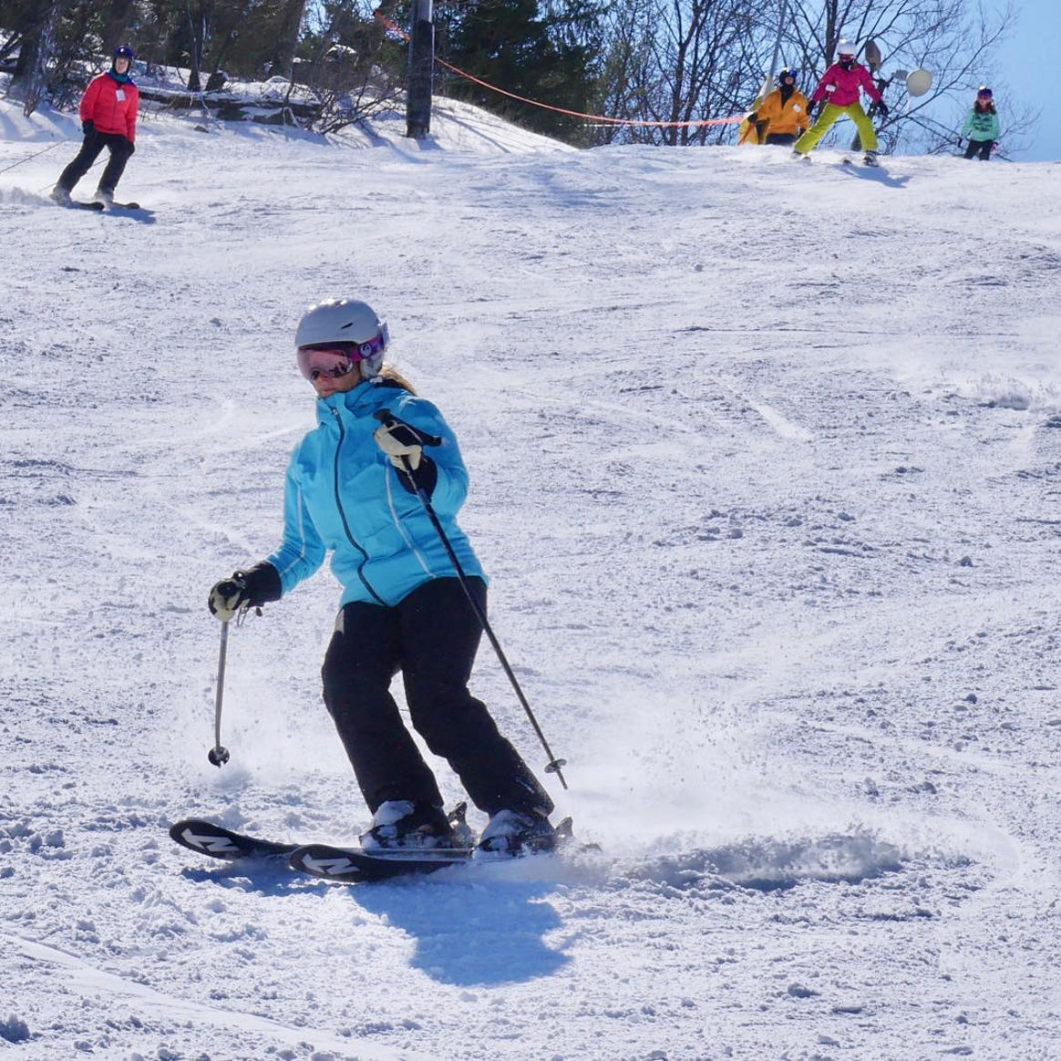 Woman Makes Downhill Turns at Roundtop