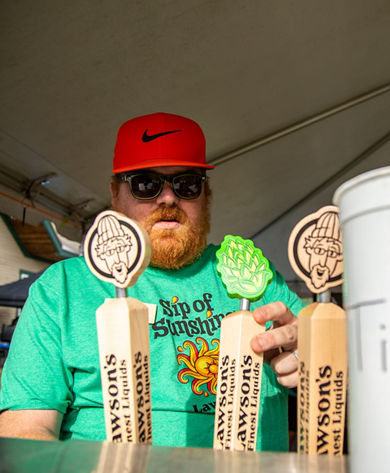 Man Pours Beer at Brewers Festival at Mount Snow