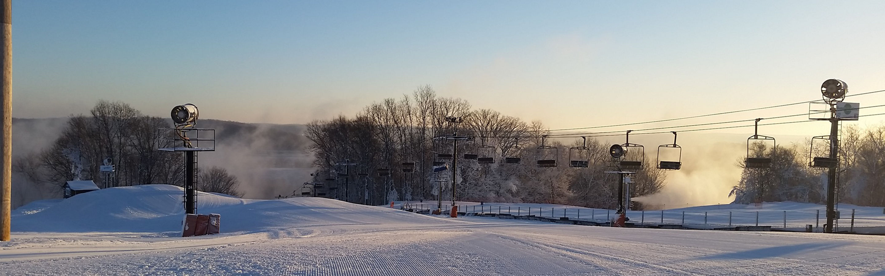 Snow Maker Blows Snow on Ski Runs at Dawn at Paoli Peaks