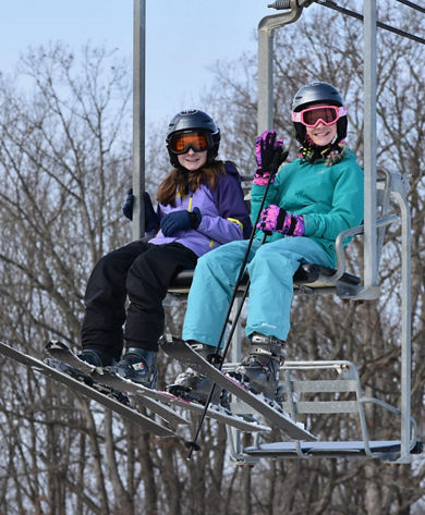 Two Woman Ride Chairlift at Paoli Peaks