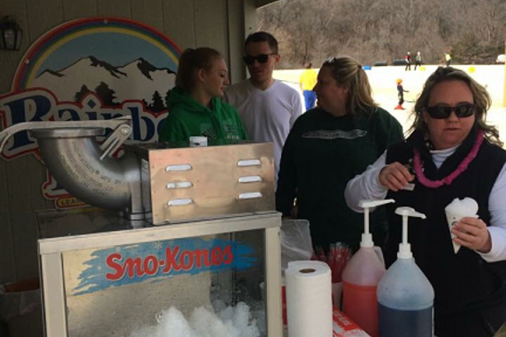 People Enjoy Snow Cones at Snow Creek