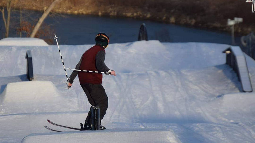 Skier Rides Through Terrain Park at Hidden Valley