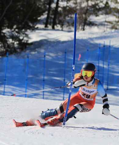 Skier Races Downhill at Hidden Valley