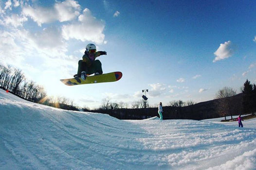 Snowboarder Gets Air at Terrain Park at Hidden Valley