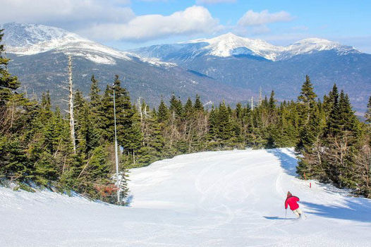 Skier Makes Turns Down Open Ski Run at Wildcat Mountain