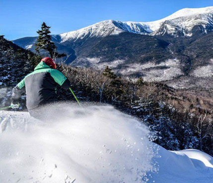 Skier Makes Turns in Fresh Powder at Wildcat Mountain