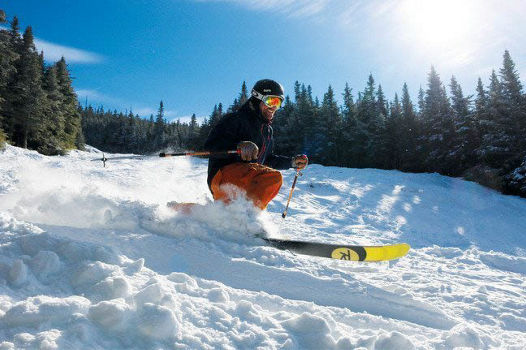 Telemark Skier Makes Big Turn at Wildcat Mountain