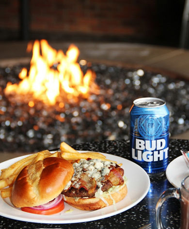 Ore Creek - Blue Cheese Bacon Burger and Fries, Bud Light, Fireplace Background