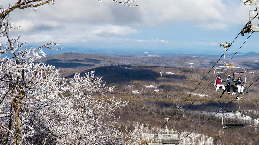 Guests on the chairlift at Crotched