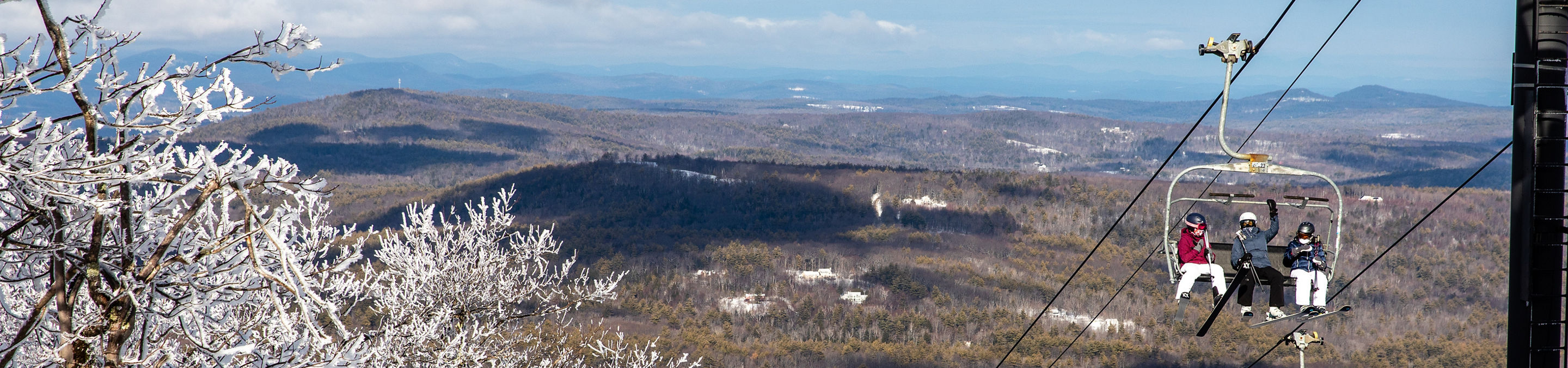 Guests on the chairlift at Crotched