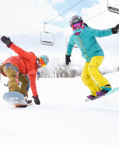 2 female boarders showing stoke