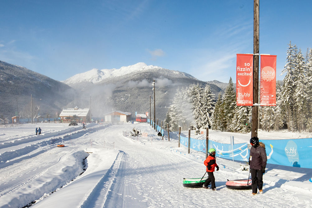 Parent and Child prepare to go tubing at Whistler's Bubly Tube Park 