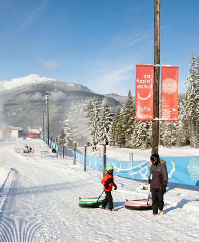 Parent and Child prepare to go tubing at the Whistler Blackcomb bubly Tube Park 