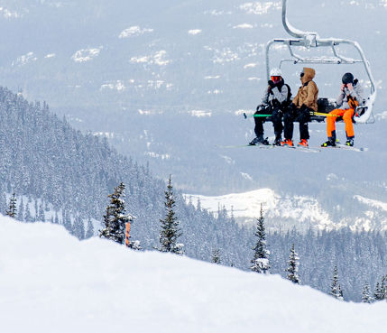 Friends on a chairlift at Whistler Blackcomb 