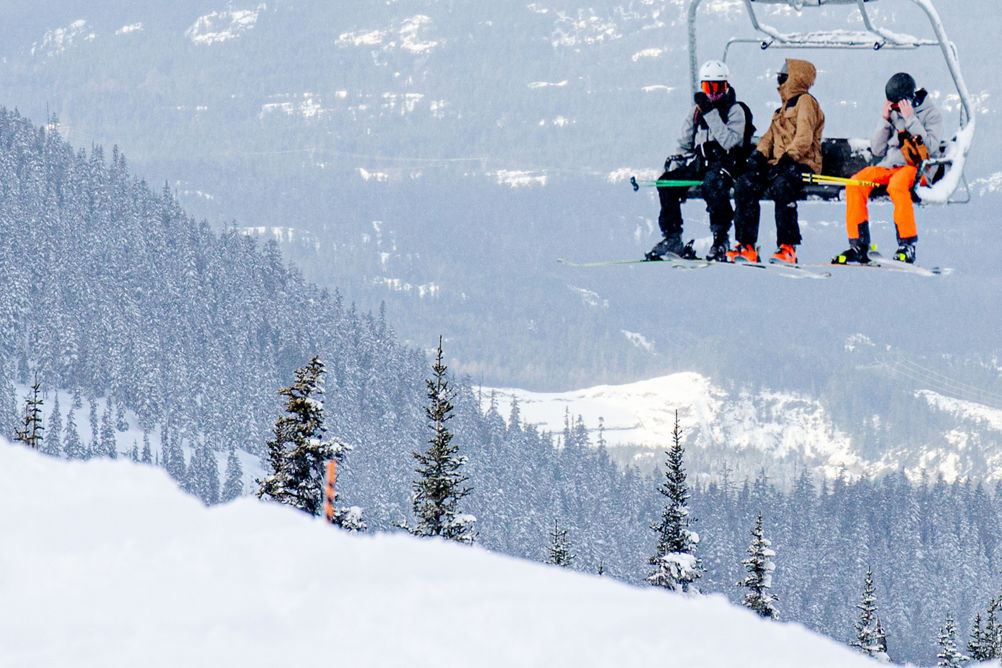 Friends on a chairlift at Whistler Blackcomb 