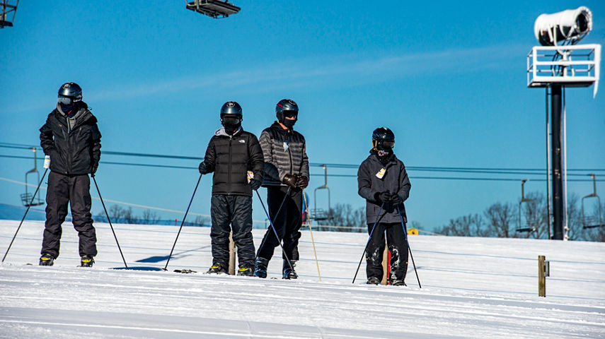Group of Skiers at the Top of Bonk Terrain Park at Paoli
