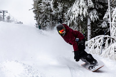 Snowboarding on a winter day at Crotched