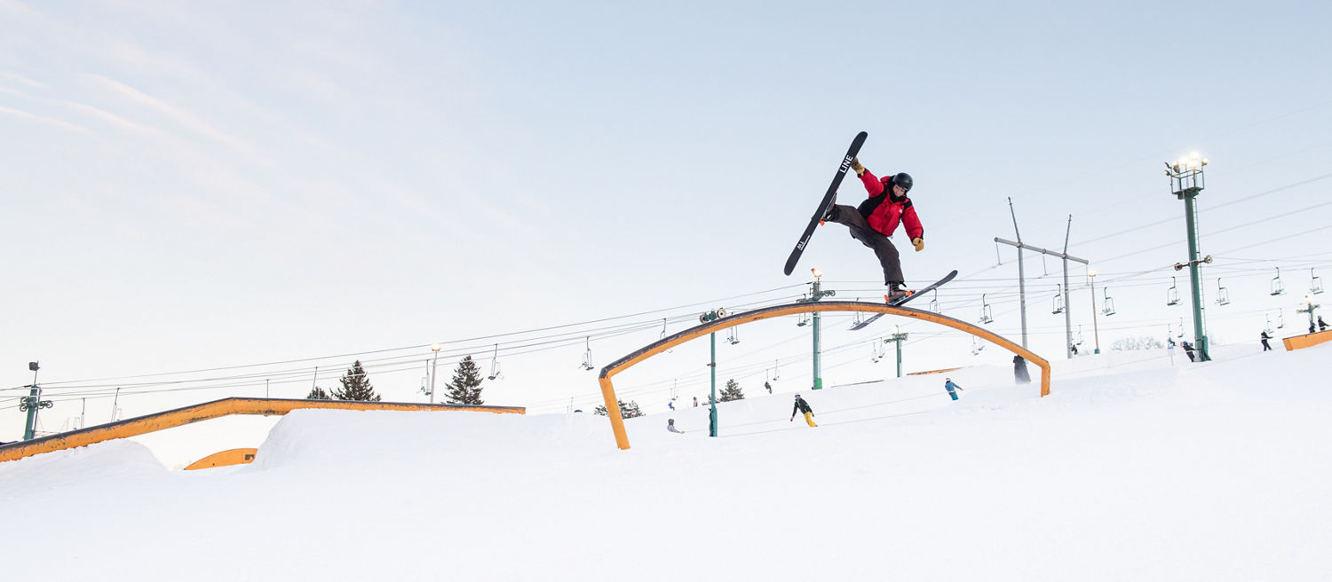 Skier Jumps Mid-Air on Rail in Terrain Park at Afton Alps, MN