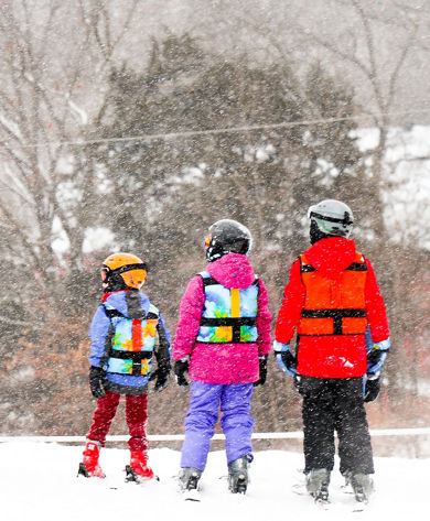 Kids participate in ski lessons at Snow Creek
