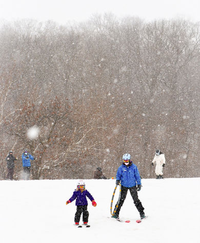 Guests participate in ski lessons at Snow Creek