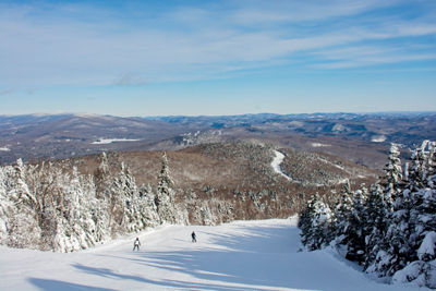Guests ski at Okemo