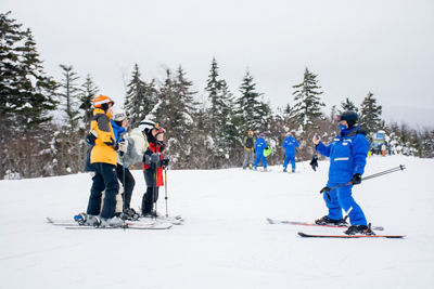 Guests pose for a photo at Okemo