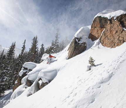 Skier turning down rocks on Morning Glory 