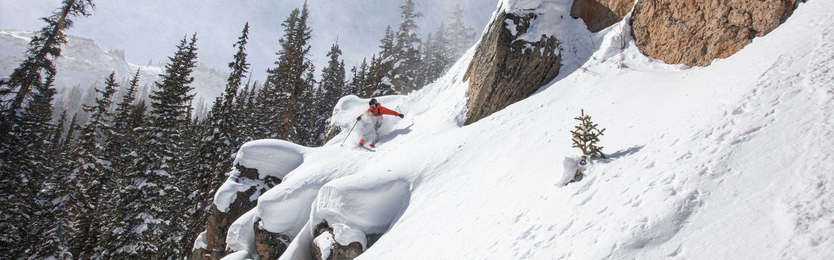 Skier turning down rocks on Morning Glory 