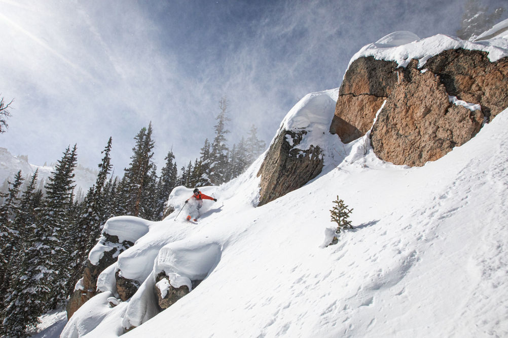 Skier turning down rocks on Morning Glory 