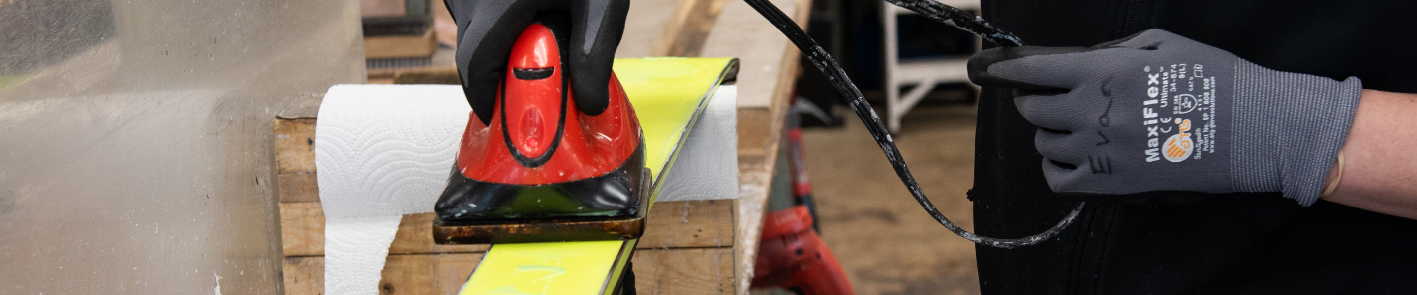Retail Shop Employee working with a ski at Afton Alps Ski Shop
