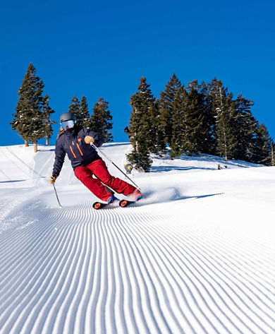 Woman Skiing under Gondola at Park City