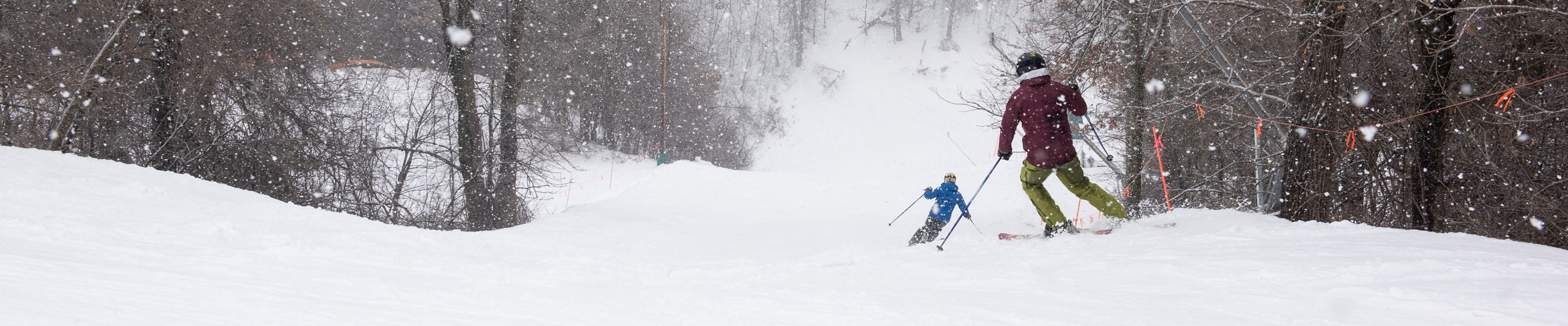 Skiing during snowfall at Afton Alps, MN