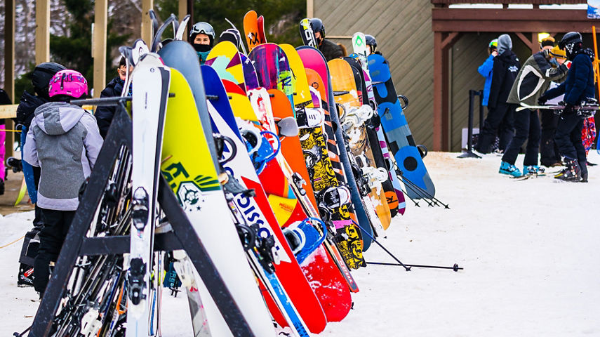 Dozens of snowboards on New Years Eve Day at Alpine Valley