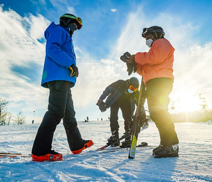 A couple learns to ski at Alpine Valley