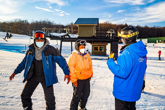 A couple learns to ski at Alpine Valley
