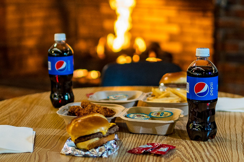 Dining in front of a fireplace at Alpine Valley