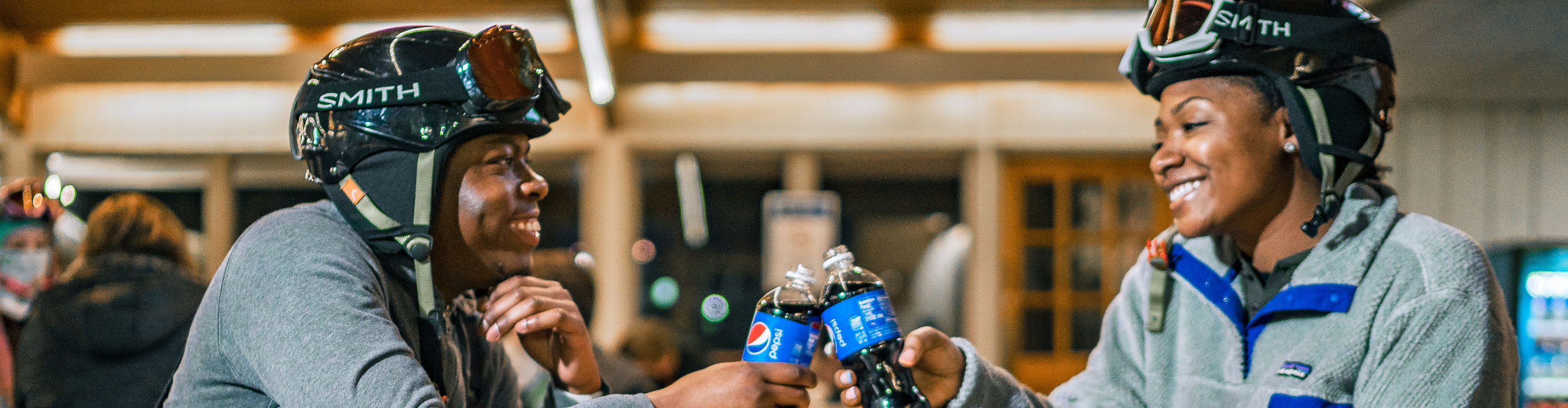 A couple shares a meal with Pepsi at Alpine Valley