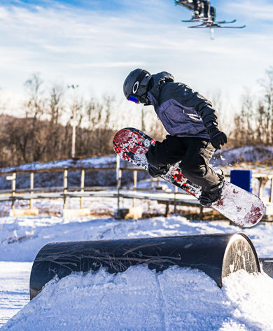 Snowboarding at the terrain park at Alpine Valley