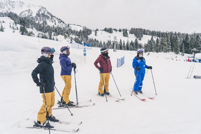 Women learn to ski from an instructor at the EDGE Outdoors Program at Stevens Pass 