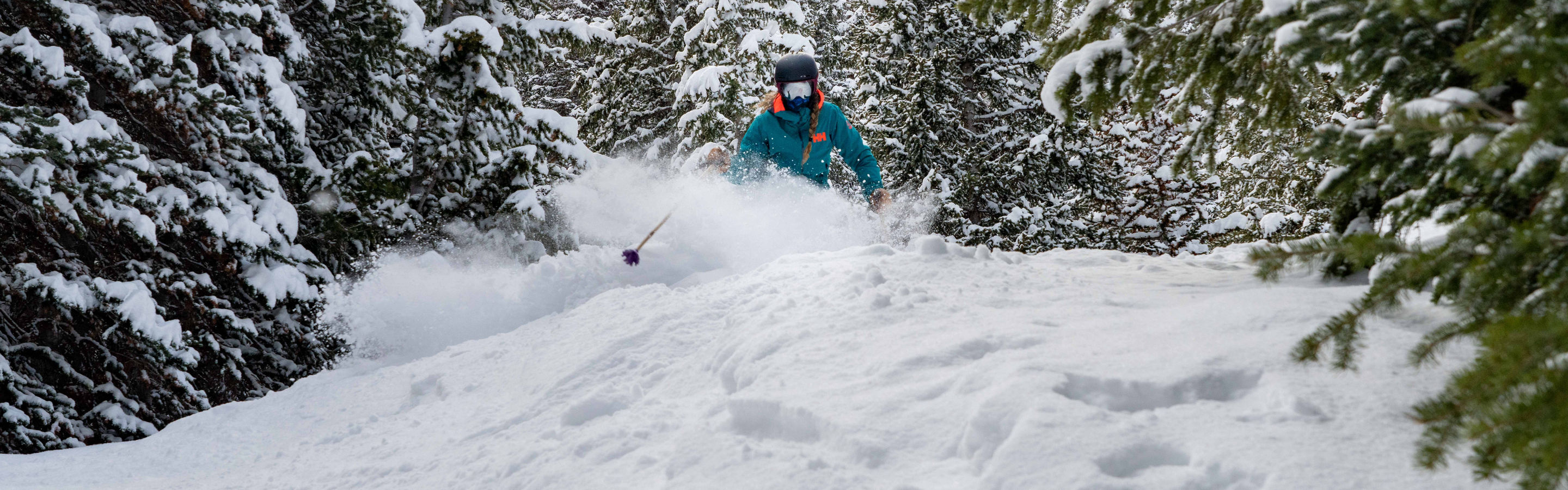 Woman Skiing Powder at Park City
