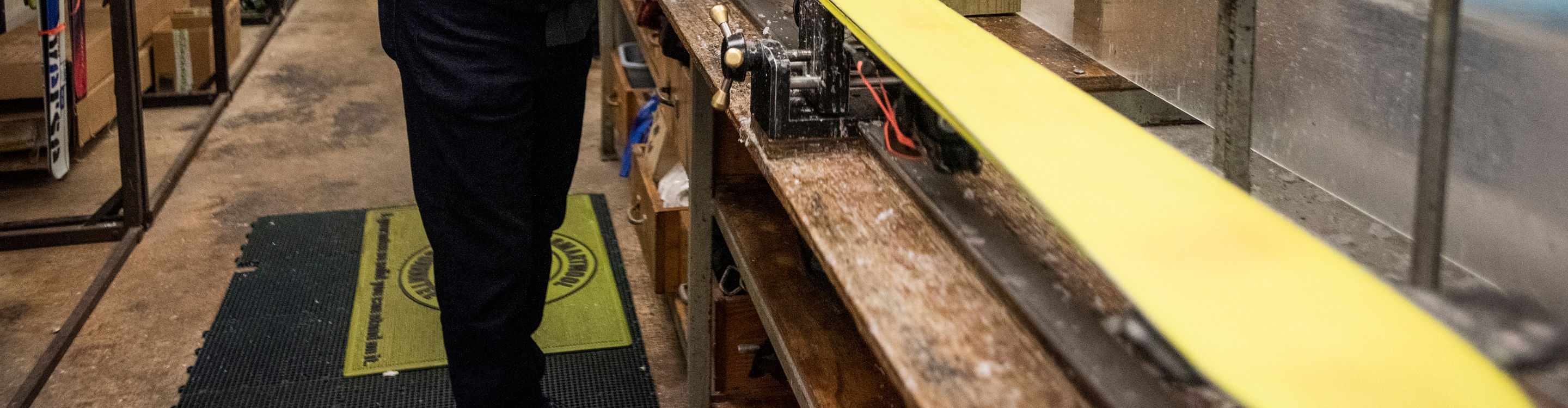 Retail Shop Employee works on some skis while at Afton Alps, MN