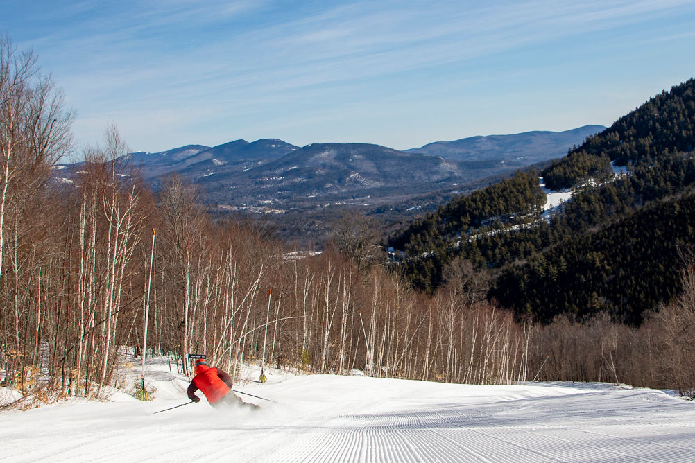 A groomed view of Attitash on a spring day