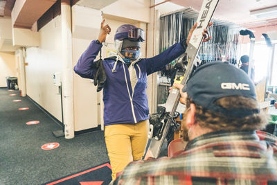 A woman rents skis for the EDGE Outdoors Program at Stevens Pass 