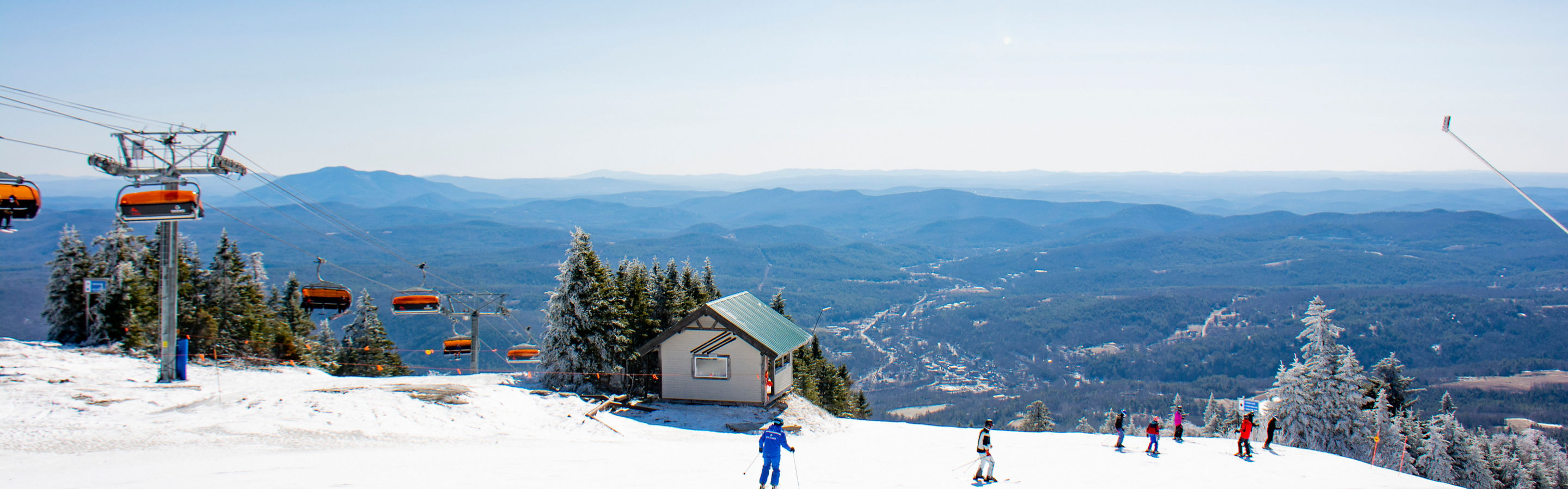 A panoramic view of guests skiing at Okemo
