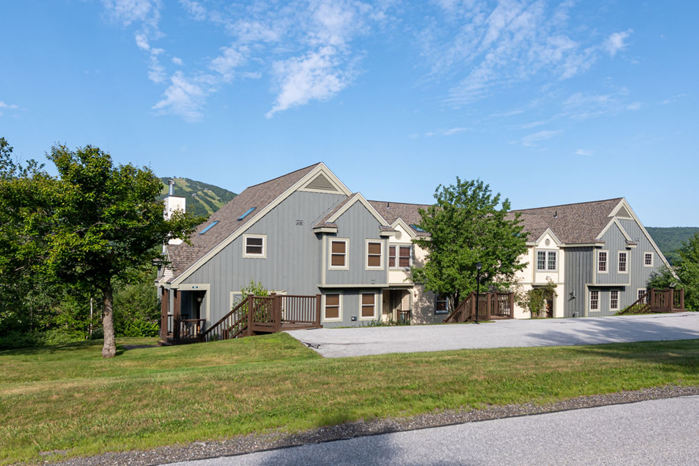 Summery Exterior of Greenspring Townhomes at Mount Snow