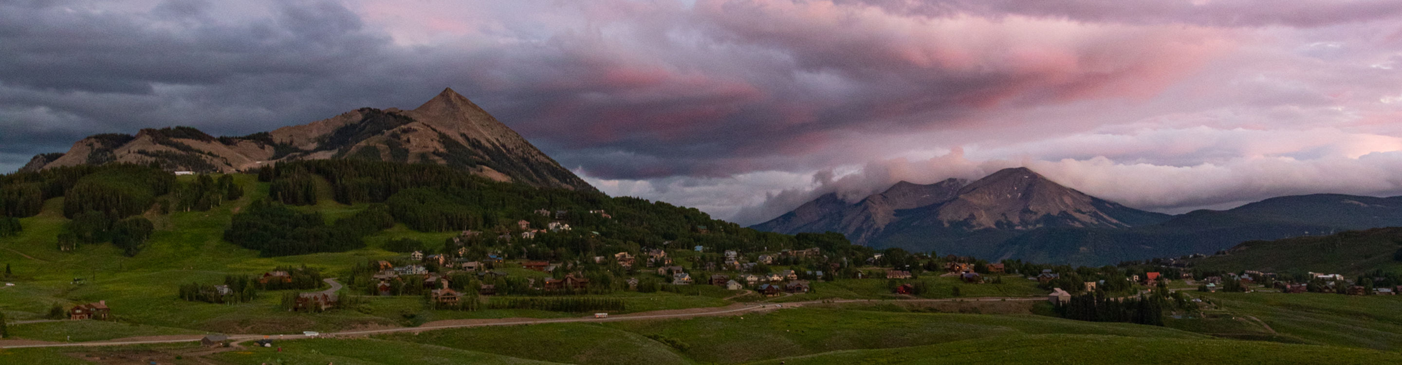 Sunset and field of wildflowers looking towards Mount Crested Butte