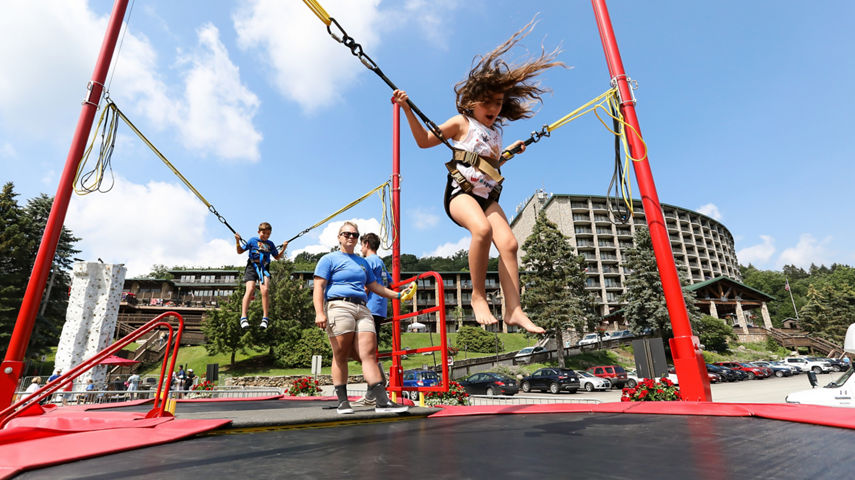 Children Jumping on Trampolines at Seven Springs